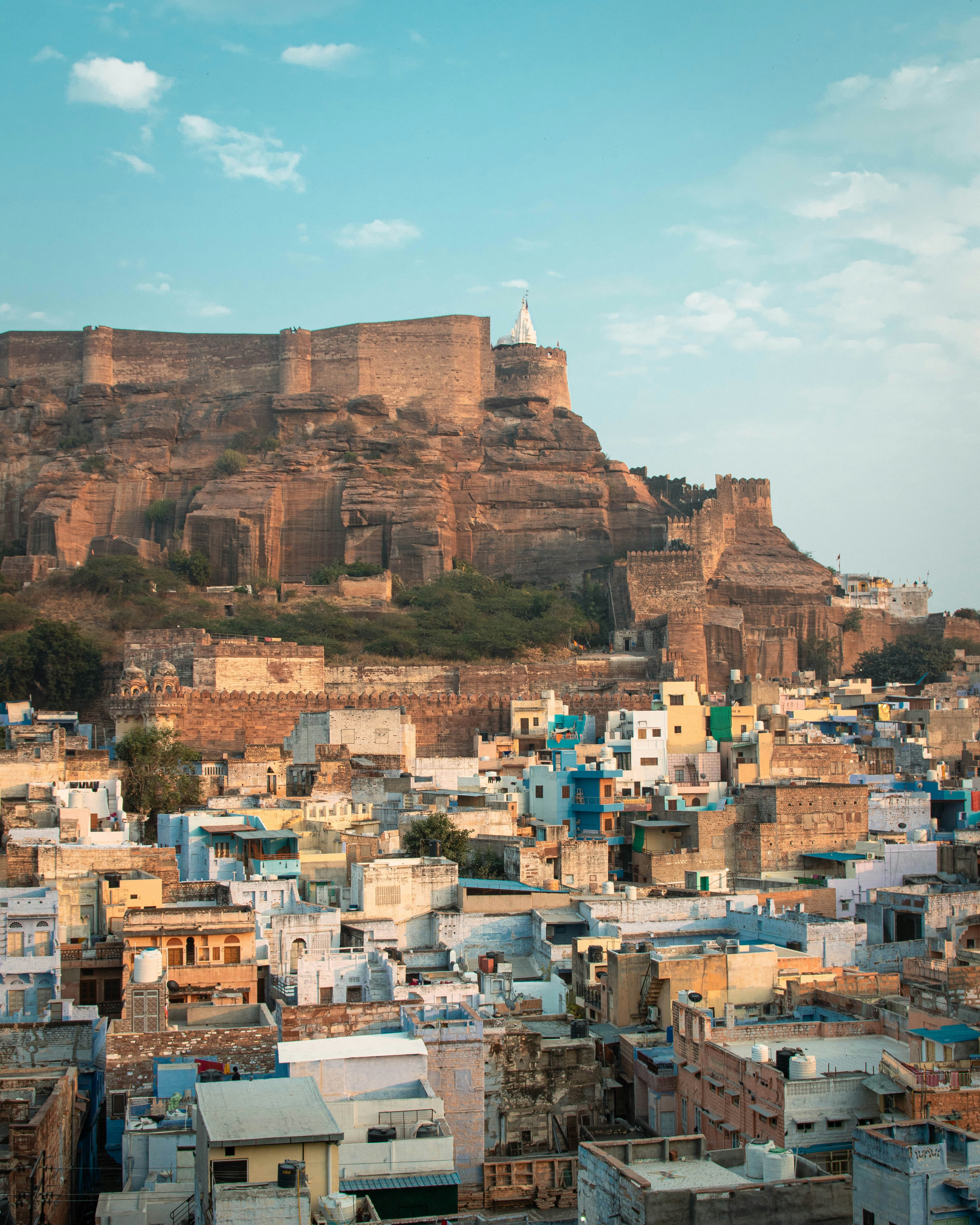 looking out towards the imposing mehrangarh fort in the blue city of jodhpur india