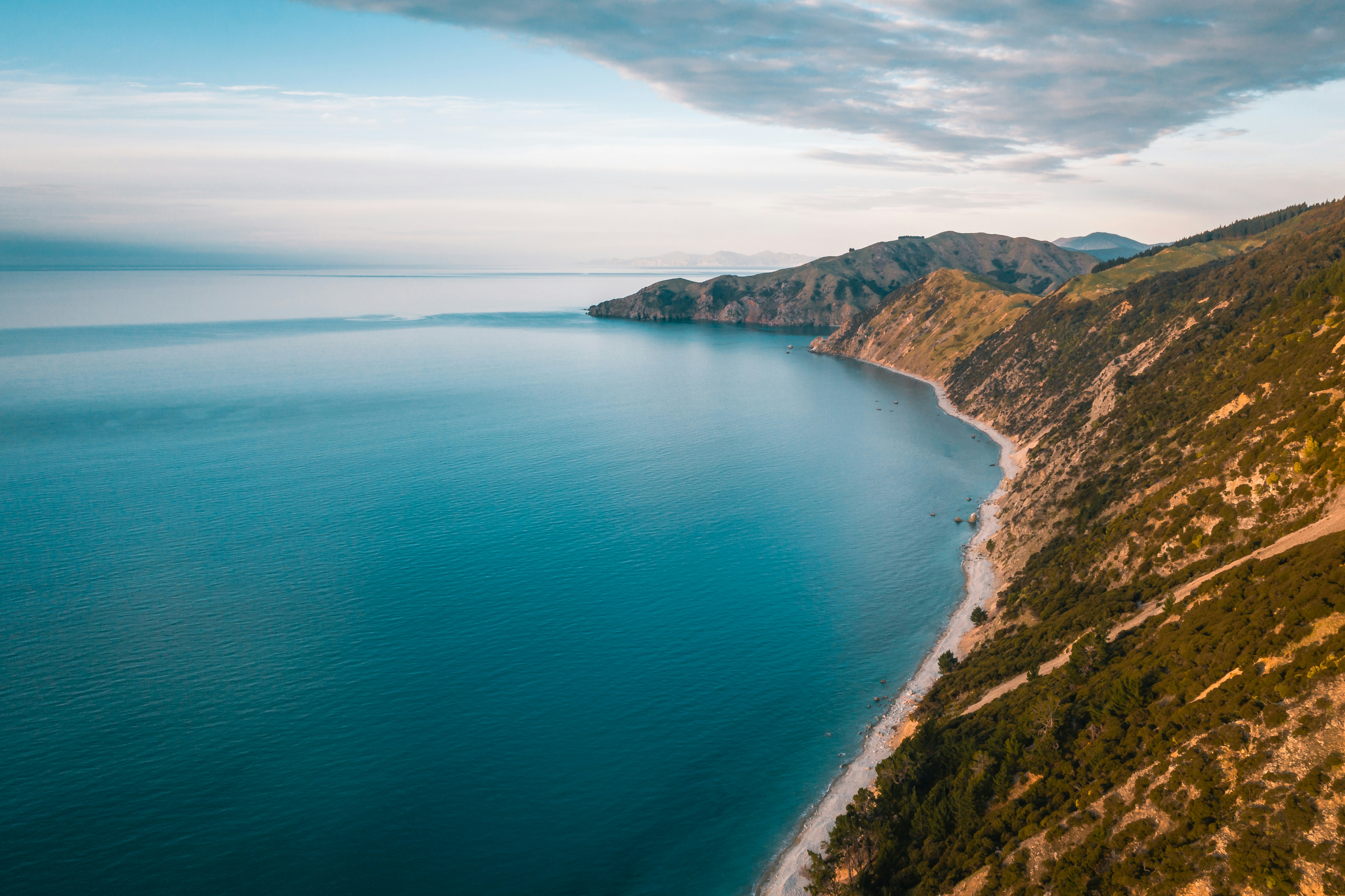 a view out towards cable bay from glenduan at sunset nelson