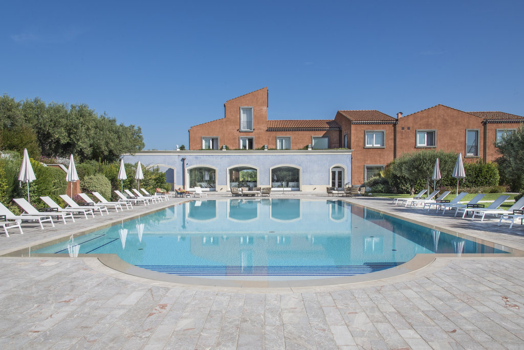 swimming pool with loungers